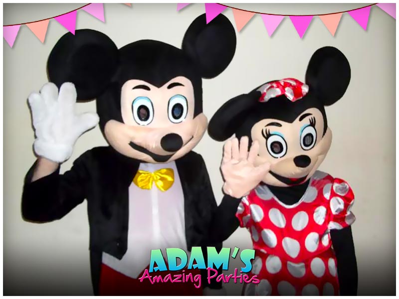 Mickey and Minnie Mouse at a birthday party